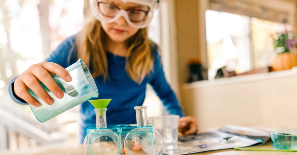 Girl-Acellus-Science-Fair Acellus Academy Science Fair Student